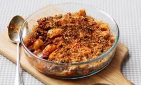 Pasta, bean and chilli bake topped with grated cheese