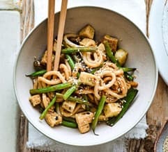 Udon noodles tossed with crispy tofu and green beans