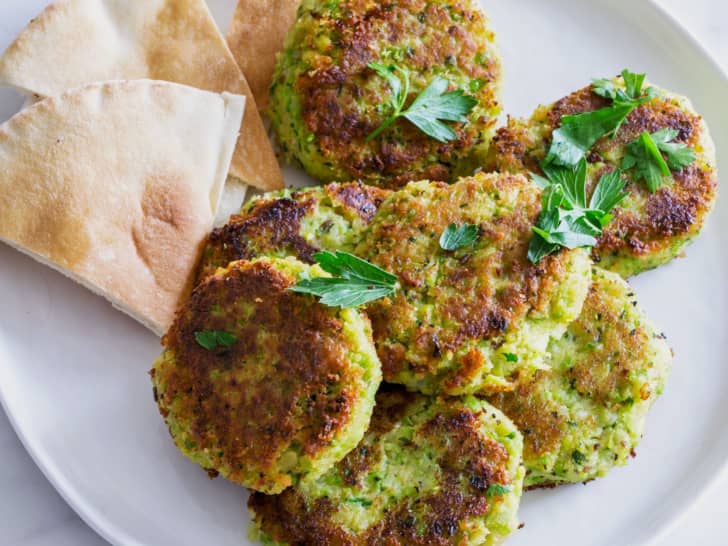 Green pea and chickpea falafel patties on a plate