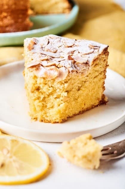 An almond flour cake topped with sliced almonds